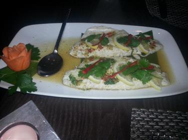 Pla Ma Now: Steamed, whole, filleted sea bass in lemongrass, galangal, kaffir lime leaves, topped with fresh lime juice and crushed chilli £18.00.PASSORN EDINBURG