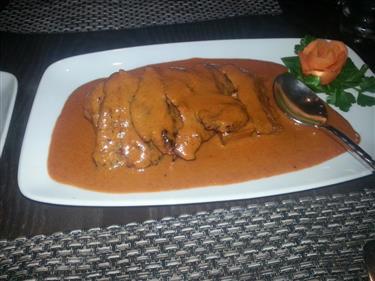 Angel Curry (signature dish): Chark grilled, marinated 8oz sirloin steak, topped with an exotic ‘Passorn” red curry sauce, served on a bed of crispy potatoes £18.25 PASSORN EDINBURG