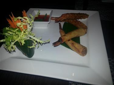 Khu Muan: King Prawns in two styles – crispy tempura in Singha beer batter, plus king prawns marinated with coriander root and wrapped in filo pastry £7.95, PASSORN EDINBURG